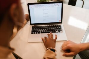 Form optimization in action: refining contact form fields on a laptop