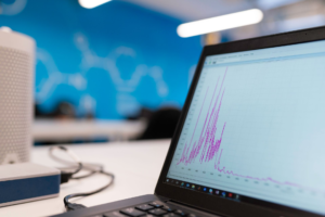 Laptop displaying data analysis graph