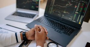 Stock market analysis on dual laptops