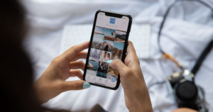 Small business owner planning TikTok ads on a smartphone