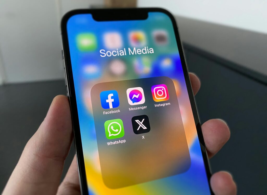 Scrolling social media ads on a phone