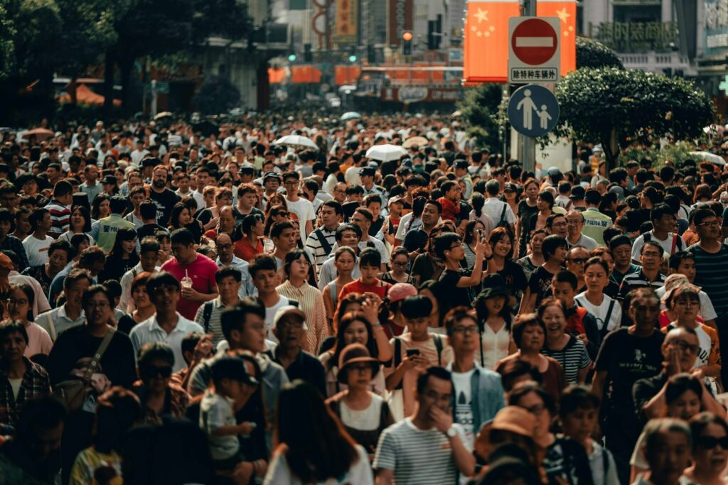 Busy city crowd representing paid social audience segments