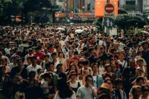 Busy city crowd representing paid social audience segments