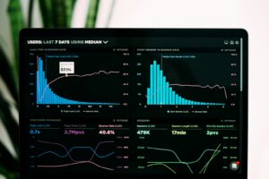 Performance analytics graphs on a laptop for comparing ad platforms