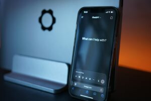 AEO vs SEO ChatGPT open on a smartphone for AI search optimization